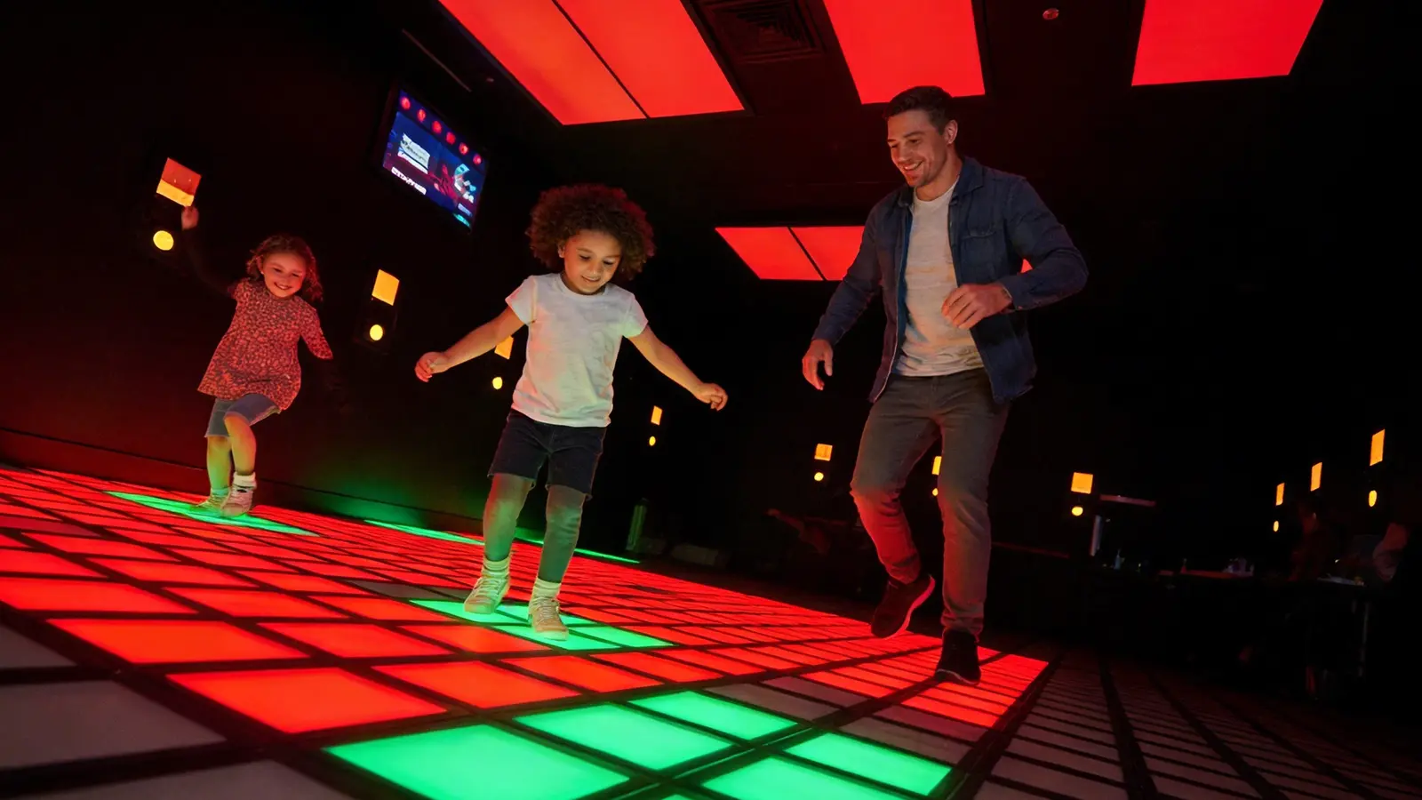Kids enjoying active gaming attraction