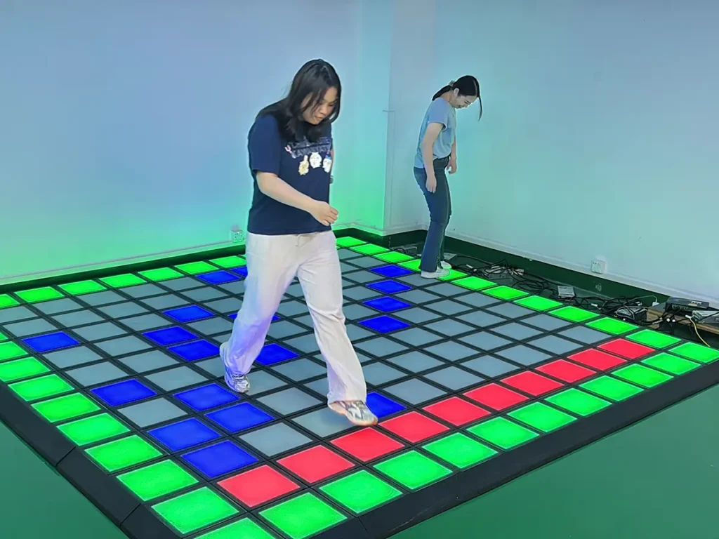 Players enjoying interactive floor games